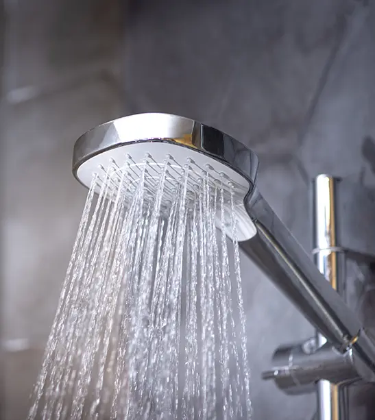 Shower head with water flowing from it